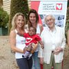 Francine Leca (fondatrice de Mécénat Chirurgie Cardiaque), Aurélie Vaneck, Juliette Chêne et le petit Jovani, lors des Yogis du coeur, à l'Orangerie du Château de Versailles le 21 septembre 2014.