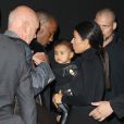  Kim Kardashian et sa fille North - Arriv&eacute;e des people au d&eacute;fil&eacute; Balenciaga pr&ecirc;t-&agrave;-porter collection Printemps-Et&eacute; 2015 lors de la Fashion Week &agrave; Paris, le 24 septembre 2014.&nbsp; 