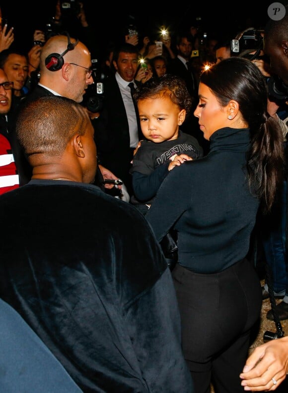 Please hide the child's face prior to the publication - Kim Kardashian and Kanye West with their daughter North are spotted arriving at the Balenciaga Fashion Show during the Paris Fashion Week in Paris, France on September 24, 2014. Photo by ABACAPRESS.COM24/09/2014 - Paris