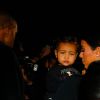 Kim Kardashian, Kanye West et leur fille North  - Arrivée des people au défilé Balenciaga prêt-à-porter collection Printemps-Eté 2015 lors de la Fashion Week à Paris, le 24 septembre 2014. 