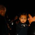  Kim Kardashian, Kanye West et leur fille North &nbsp;- Arriv&eacute;e des people au d&eacute;fil&eacute; Balenciaga pr&ecirc;t-&agrave;-porter collection Printemps-Et&eacute; 2015 lors de la Fashion Week &agrave; Paris, le 24 septembre 2014.&nbsp; 