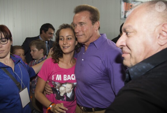 Arnold Schwarzenegger et sa compagne Heather Milligan visitent le "Arnold Classic Europe 2014" à Madrid. Le 27 septembre 2014 .