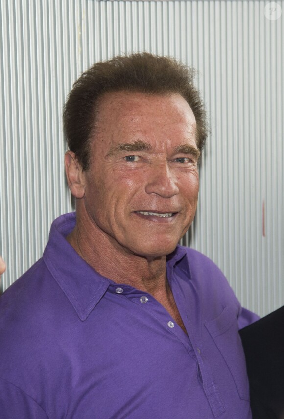 Arnold Schwarzenegger et sa compagne Heather Milligan visitent le "Arnold Classic Europe 2014" à Madrid. Le 27 septembre 2014 .