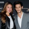 Pierre Niney et sa compagne à la première de Mommy au Mk2 Bibliothèque à Paris, le 30 septembre 2014.