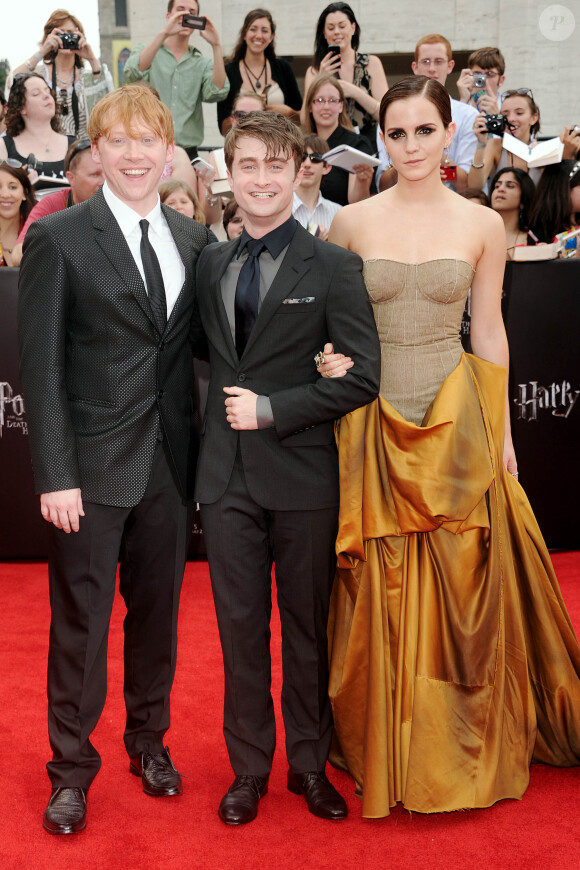 Rupert Grint, Daniel Radcliffe, Emma Watson à New York le 11 juillet 2011. 