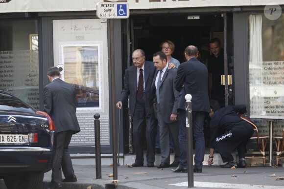 Jacques Chirac a déjeuné au restaurant "Le père Claude" avec sa femme Bernadette et sa fille Claude à Paris le 4 octobre 2014.