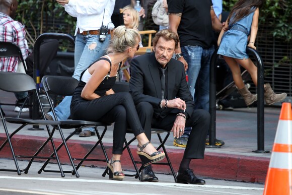 Laeticia Hallyday et Johnny Hallyday sur le tournage de son nouveau clip "Seul" (chanson extraite de son nouvel album "Rester Vivant") à Los Angeles, le 12 octobre 2014.