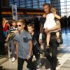 David Beckham et ses enfants Romeo, Cruz, et Harper surpris à l'aéroport LAX à Los Angeles, le 29 aout 2014