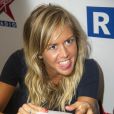 Enora Malagré en séance de dédicaces chez Virgin Radio lors des Journées du Patrimoine à Paris, le 21 septembre 2014.