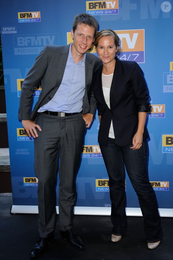 Damien Gourlet et sa collègue Roselyne Dubois à la conférence de BFMTV à Paris, le 4 septembre 2013
