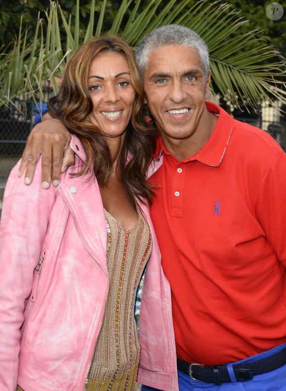 Samy Naceri et sa compagne Audrey à l'ouverture de la fête des Tuileries 2014 à Paris le 27 juin 2014.