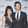 Romain Grosjean et sa femme Marion Jollès lors du dîner de Gala du 92e Grand Prix d'Amérique au Grand Palais à Paris le 26 janvier 2013