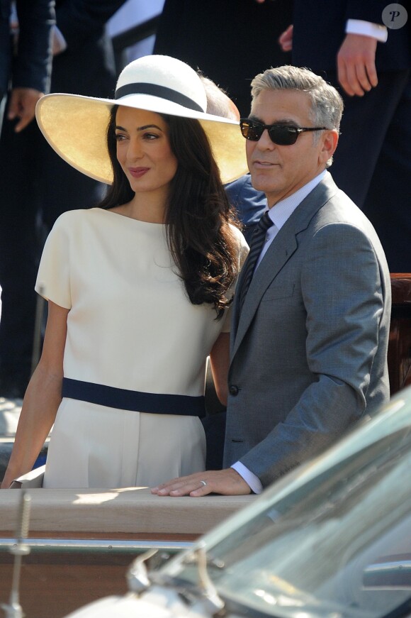 George Clooney et sa femme Amal Alamuddin quittent Venise, le 29 septembre 2014 après leur mariage.
