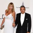 Richard Virenque et sa compagne Marie-Laure au dîner de gala de l'amfAR au Cap d'Antibes lors du 67e festival du film de Cannes, le 22 mai 2014. Le couple a eu le 3 octobre 2014 son premier enfant, un fils prénommé Eden.