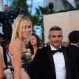 Richard Virenque avec sa charmante compagne Marie-Laure à Cannes le 23 mai 2013 lors du 66e Festival du film.  Le couple a eu le 3 octobre 2014 son premier enfant, un fils prénommé Eden. 