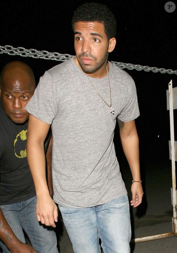 Le rappeur Drake à la sortie du Club "Hooray Henry" à West Hollywood, le 18 juillet 2014.