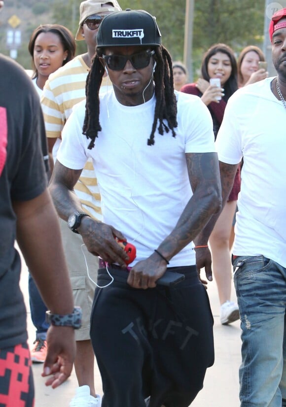 Lil Wayne assiste à la journée caritative organisée par Chris Brown à Glendale, le 19 juillet 2014.