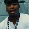 Ne-Yo dans le clip de ''Money Can't Buy'', en duo avec le rappeur Jeezy, dévoilé en octobre 2014.