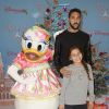 Gael Clichy et sa fille assistent au lancement des festivités de Noël à Disneyland Paris, à Marne-la-Vallée, le samedi 15 novembre 2014.