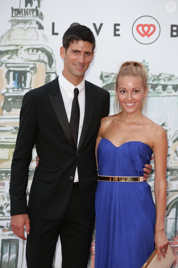 Novak Djokovic et sa compagne Jelena Ristic lors de la soirée "Love Ball" organisée par Natalia Vodianova au profit de la Fondation "The Naked Heart" à l'Opéra Garnier à Monaco, le 27 juillet 2013. Le couple s'est marié au Monténégro en juillet 2014.