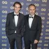 Alexandre Bompard et Emmanuel Poncet, rédacteur en chef GQ - Soirée "L'homme de l'année GQ 2014" au Musée d'Orsay, à Paris le 19 novembre 2014.