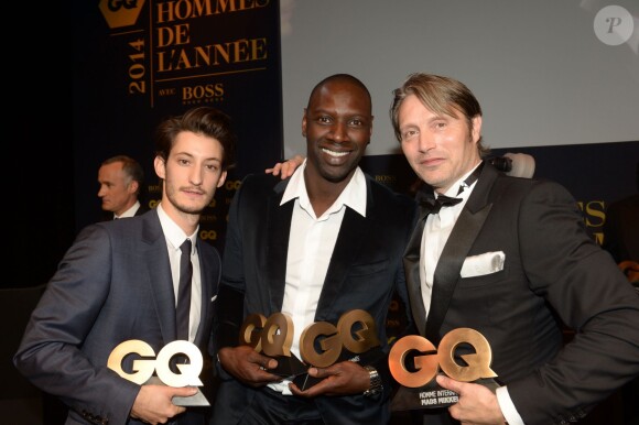 Exclusif - Pierre Niney, Omar Sy et Mads Mikkelsen lors de la soirée GQ au Musée d'Orsay, Paris, le 19 novembre 2014.