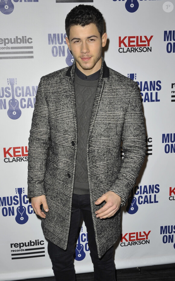 Nick Jonas à la soirée "Musicians On Call" en l'honneur de Kelly Clarkson et Charlie Walk à New York, le 18 novembre 2014.