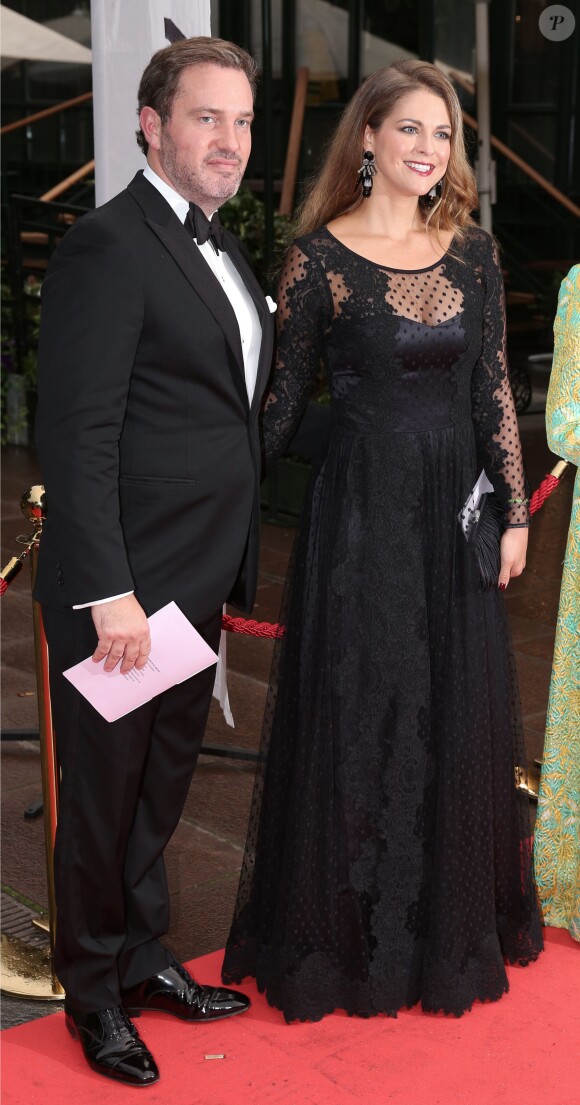 La princesse Madeleine de Suède et son mari Chris O'Neill à un dîner de gala de la fondation World Childhood à Stockholm en Suède le 8 septembre 2014.