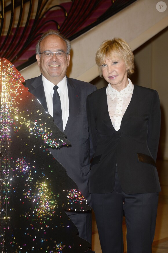 Professeur David Khayat et Marie-Christiane Marek lors de la 19e édition des Sapins de Noël des créateurs au théâtre des Champs-Elysées à Paris, le 27 novembre 2014.