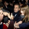 Nicolas Sarkozy et sa femme Carla Bruni arrivent au QG de campagne après l'annonce de sa victoire à la présidence de l'UMP. Le 29 novembre 2014.
