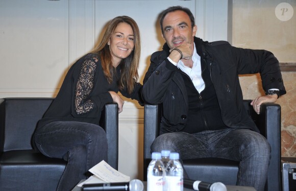 Exclusif - Elsa Fayer et Nikos Aliagas - 3ème présentation du Spot "e-fluent mums", le salon des parents blogueurs, au Palais Brongniart à Paris, le 3 décembre 2014.