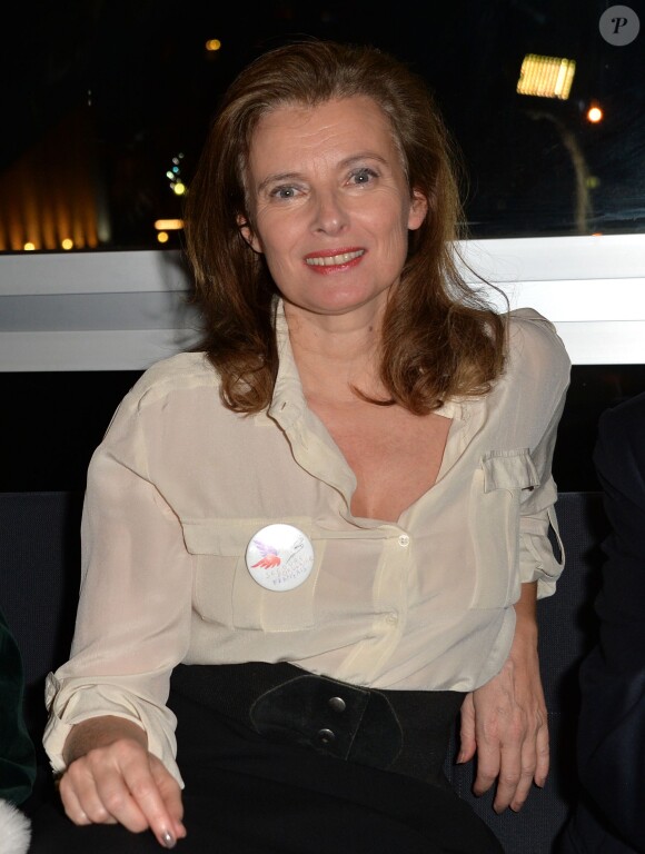 Valérie Trierweiler assiste à la soirée du 70e anniversaire et du coup d'envoi de la campagne des Pères Noël Verts du Secours Populaire au palais de l'Unesco. Paris, le 8 décembre 2014.