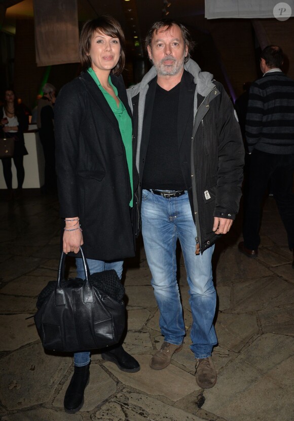Christophe Alévêque et sa femme Serena Reinaldi assistent à la soirée du 70e anniversaire et du coup d'envoi de la campagne des Pères Noël Verts du Secours Populaire au palais de l'Unesco. Paris, le 8 décembre 2014.