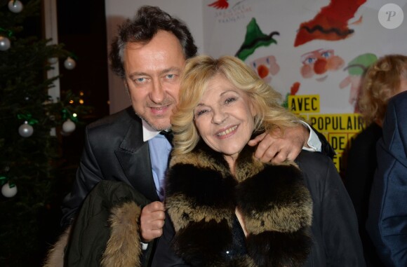 Nicoletta et son mari Jean-Christophe Molinier assistent à la soirée du 70e anniversaire et du coup d'envoi de la campagne des Pères Noël Verts du Secours Populaire au palais de l'Unesco. Paris, le 8 décembre 2014.
