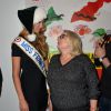 Camille Cerf (Miss France 2015) et Josiane Balasko assistent à la soirée du 70e anniversaire et du coup d'envoi de la campagne des Pères Noël Verts du Secours Populaire au palais de l'Unesco. Paris, le 8 décembre 2014.