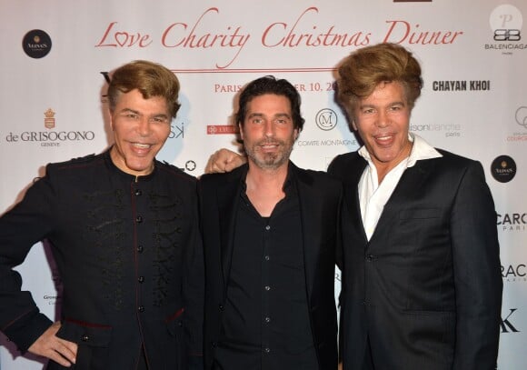 Richard Orlinski, Grichka et Igor Bogdanoff (Bogdanov) lors du dîner de gala "Love Charity Christmas Dinner" organisé par l'association "Lyubov" au profit des enfants de Donetsk à la Maison Blanche à Paris, le 10 décembre 2014.