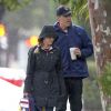 Exclusif - Malgré la pluie, Reese Witherspoon et Jim Toth sont allés se promener avec leur fils Tennessee dans les rues de Santa Monica. Le 12 décembre 2014.