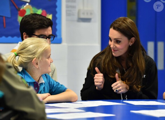 Kate Middleton, enceinte, lors d'un événement avec des scouts le 16 décembre 2014 à Londres