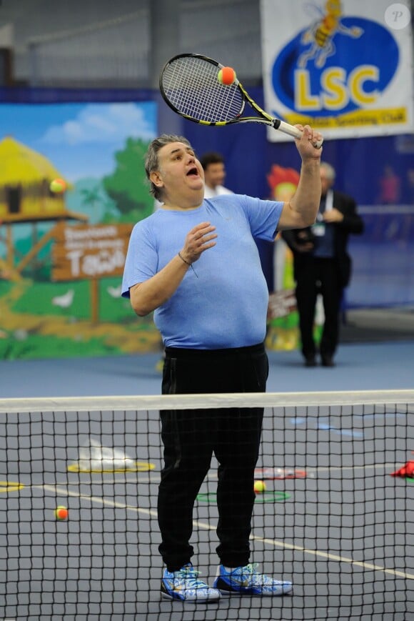 Pierre Ménès lors de la journée Sourire Gagnant organisée par l'association Enfant Star et Match au Levallois Sporting Club le 18 décembre 2014