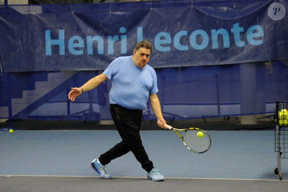 Pierre Ménès lors de la journée Sourire Gagnant organisée par l'association Enfant Star et Match au Levallois Sporting Club le 18 décembre 2014