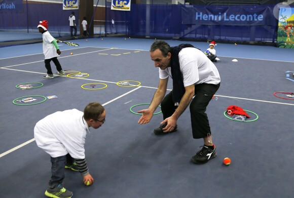 Pascal Sellem lors de la journée Sourire Gagnant organisée par l'association Enfant Star et Match au Levallois Sporting Club le 18 décembre 2014