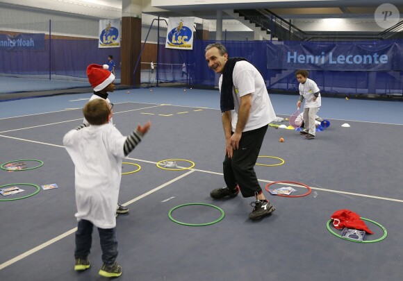 Pascal Sellem lors de la journée Sourire Gagnant organisée par l'association Enfant Star et Match au Levallois Sporting Club le 18 décembre 2014
