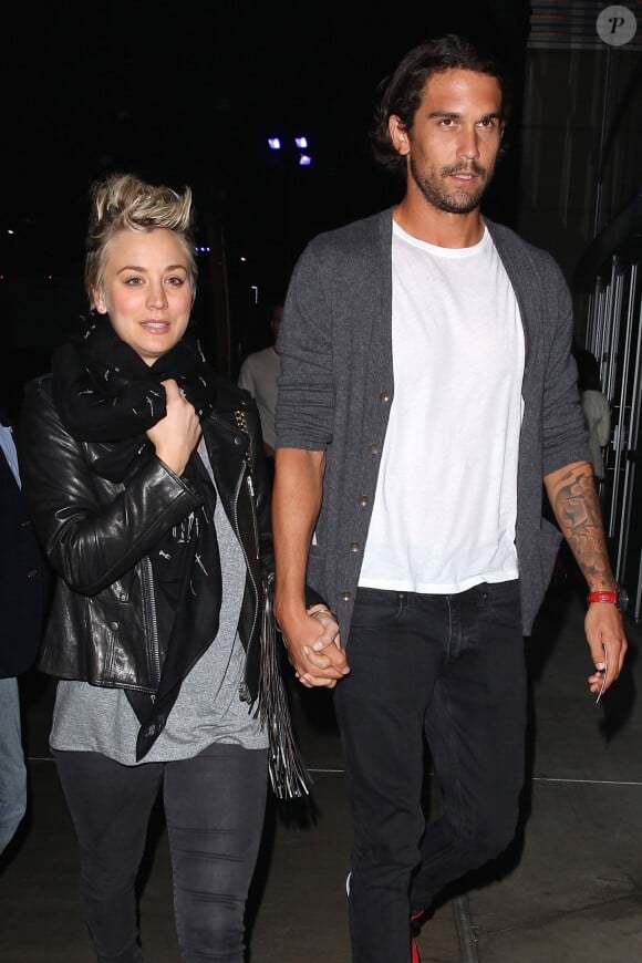 Kaley Cuoco and husband Ryan Sweeting hold hands as they leave an enjoyable Lakers game in West Hollywood, Los angeles, CA, USA on November 14, 2014. Kaley keeps her self bundled up in a black leather jacket and black scarf. Photo by GSI/ABACAPRESS.COM15/11/2014 - Los Angeles