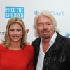 Holly Branson et son père Richard Branson lors de l'événement "We Day UK" au stade de Wembley à Londres, le 7 mars 2014.