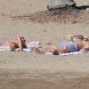 Exclusif - Lea Michele et son petit-ami Matthew Paetz bronzent sur la plage le jour de Noël lors de leurs vacances au Mexique, le 25 décembre 2014.