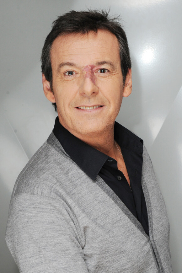 Portrait de Jean-Luc Reichmann pris à Paris, le 18 décembre 2014.