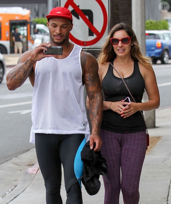 Kelly Brook et son compagnon David McIntosh quittent la salle de gym à West Hollywood, le 14 juillet 2014. 