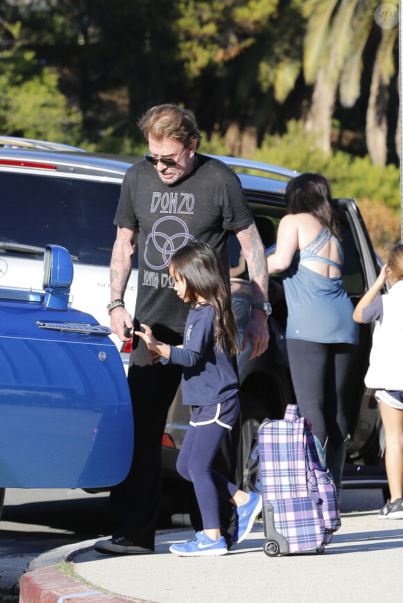 Le rockeur Johnny Hallyday se rend à son cours de gym, avant d'aller chercher sa fille Joy à l'école à Los Angeles, le vendredi 16 janvier 2015.
