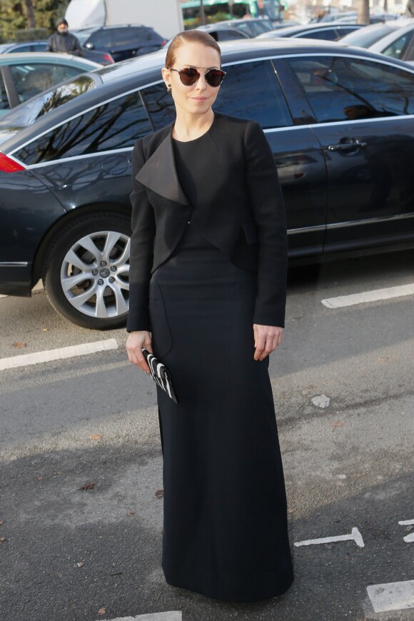 Noomi Rapace au défilé de mode hommes Dior collection prêt-à-porter Automne Hiver 2015/2016 au Tennis Club de Paris le 24 janvier 2015.