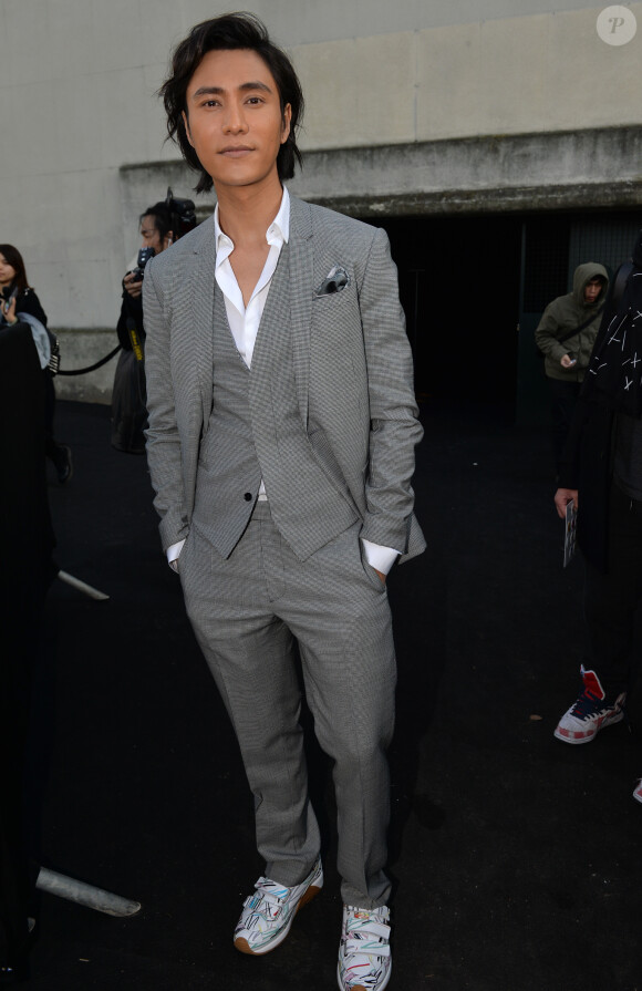 Chan Kun au défilé de mode hommes Dior collection prêt-à-porter Automne Hiver 2015/2016 au Tennis Club de Paris le 24 janvier 2015.